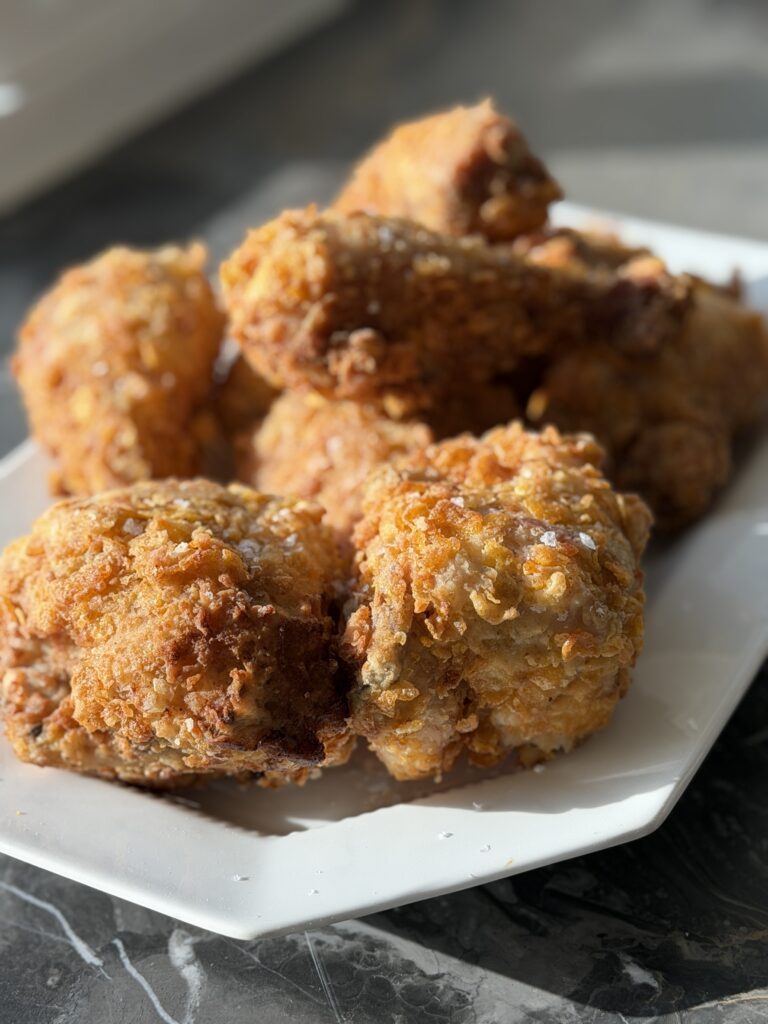 a plate of crunchy fried chicken
